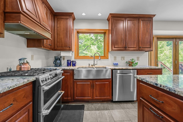 11960 Albavar Path, Inver Grove Heights, MN 55077 - kitchen featuring appliances with stainless steel finishes, a sink, healthy amount of natural light, light stone countertops, and recessed lighting