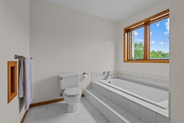 11960 Albavar Path, Inver Grove Heights, MN 55077 - full bathroom featuring toilet, a garden tub, baseboards, and tile patterned flooring