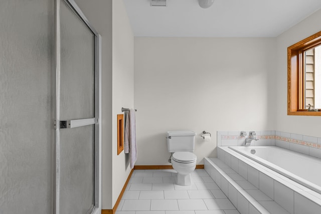 11960 Albavar Path, Inver Grove Heights, MN 55077 - full bathroom with toilet, a garden tub, baseboards, a shower stall, and tile patterned floors