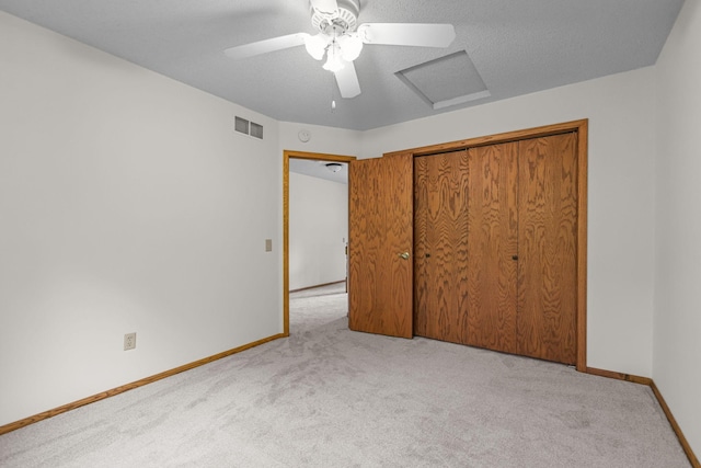 11960 Albavar Path, Inver Grove Heights, MN 55077 - unfurnished bedroom featuring carpet flooring, attic access, baseboards, and a ceiling fan