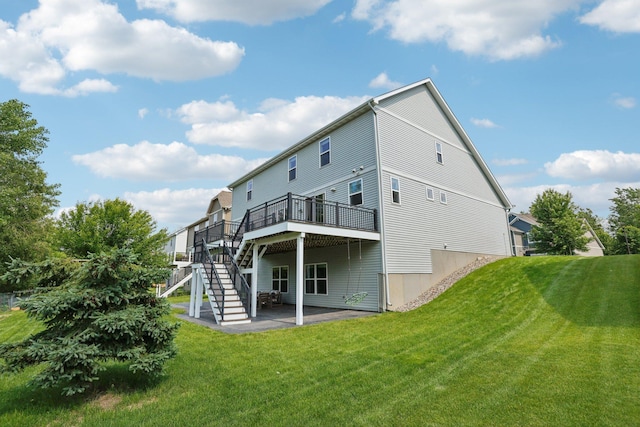 18482 Aubrie Ct, Eden Prairie, MN 55347 - back of property featuring stairway, a wooden deck, a patio area, and a yard