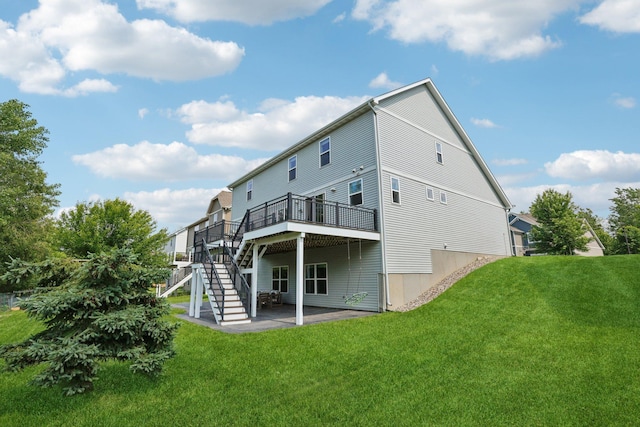 18482 Aubrie Ct, Eden Prairie, MN 55347 - rear view of property with stairway, a deck, a patio area, and a yard
