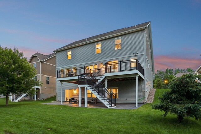 18482 Aubrie Ct, Eden Prairie, MN 55347 - back of house with stairway, a patio, a wooden deck, and a yard
