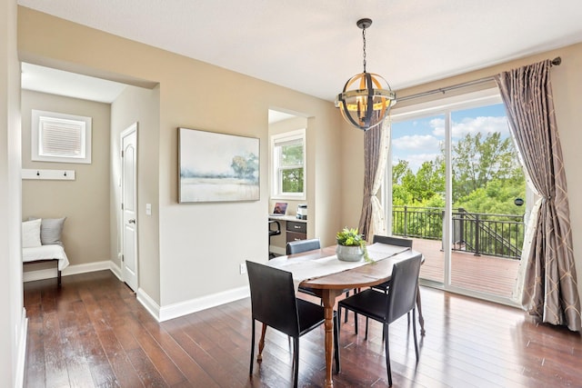 18482 Aubrie Ct, Eden Prairie, MN 55347 - dining room featuring a chandelier and dark wood-style flooring