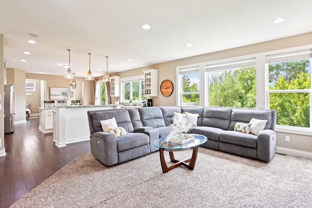 18482 Aubrie Ct, Eden Prairie, MN 55347 - living area featuring plenty of natural light, recessed lighting, and dark wood-style flooring