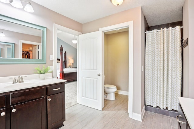 18482 Aubrie Ct, Eden Prairie, MN 55347 - bathroom with vanity, wood finish floors, and curtained shower