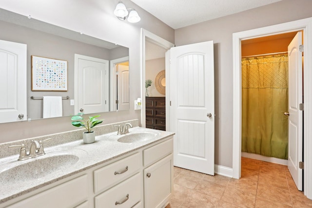 18482 Aubrie Ct, Eden Prairie, MN 55347 - full bath with double vanity and tile patterned floors