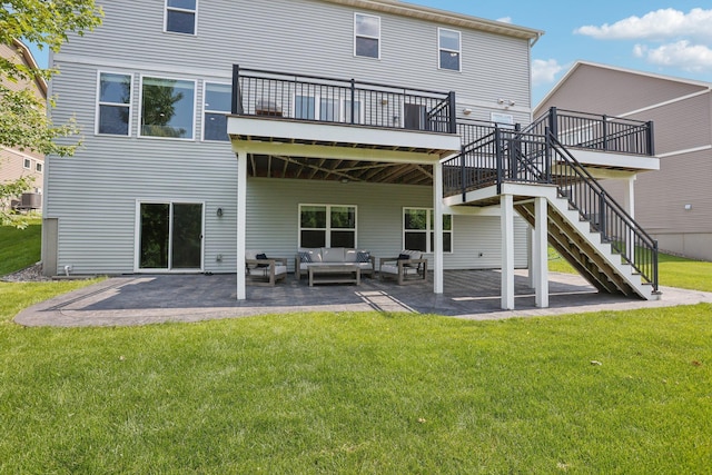 18482 Aubrie Ct, Eden Prairie, MN 55347 - rear view of property featuring an outdoor hangout area, a patio, a deck, a lawn, and stairs