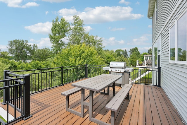 18482 Aubrie Ct, Eden Prairie, MN 55347 - wooden terrace with grilling area and outdoor dining space