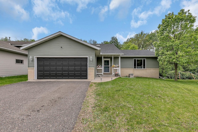 1114 Summit Way, Sauk Rapids, MN 56379 - ranch-style home featuring brick siding, a garage, asphalt driveway, and a front lawn