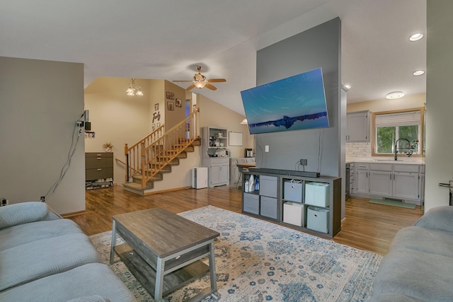 1114 Summit Way, Sauk Rapids, MN 56379 - living room with a ceiling fan, stairs, light wood-type flooring, lofted ceiling, and recessed lighting