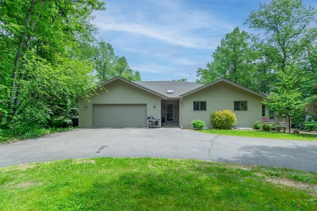 27488 Ridgewood Dr, Merrifield, MN 56465 - ranch-style home with asphalt driveway, a garage, and a front yard