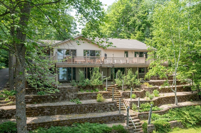 27488 Ridgewood Dr, Merrifield, MN 56465 - back of house featuring stairs and a wooden deck