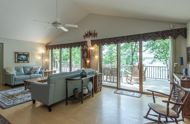 27488 Ridgewood Dr, Merrifield, MN 56465 - living area featuring high vaulted ceiling, ceiling fan, and light wood finished floors
