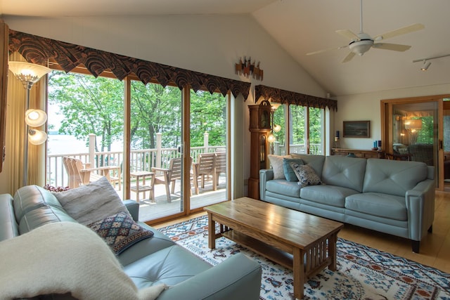 27488 Ridgewood Dr, Merrifield, MN 56465 - living room with vaulted ceiling, wood finished floors, and a ceiling fan