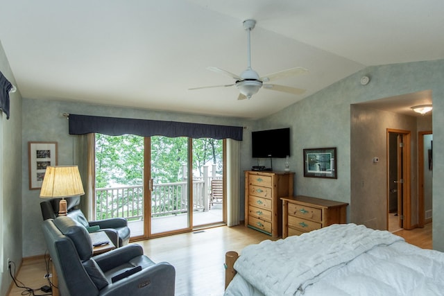 27488 Ridgewood Dr, Merrifield, MN 56465 - bedroom featuring access to exterior, light wood-style flooring, lofted ceiling, and ceiling fan