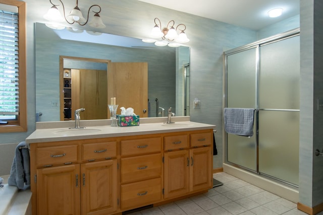 27488 Ridgewood Dr, Merrifield, MN 56465 - bathroom with a chandelier, tile patterned floors, double vanity, and a shower stall