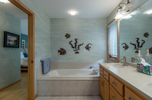 27488 Ridgewood Dr, Merrifield, MN 56465 - bathroom with a garden tub, double vanity, connected bathroom, and a chandelier