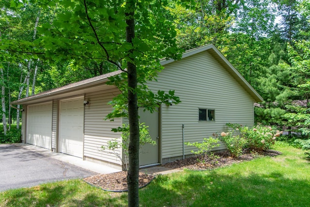 27488 Ridgewood Dr, Merrifield, MN 56465 - view of side of property with a detached garage