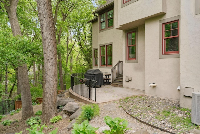 1501 June Ave S, Golden Valley, MN 55416 - view of patio / terrace with entry steps and a grill