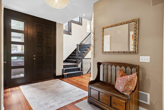 1501 June Ave S, Golden Valley, MN 55416 - entryway with stairs, wood finished floors, and vaulted ceiling