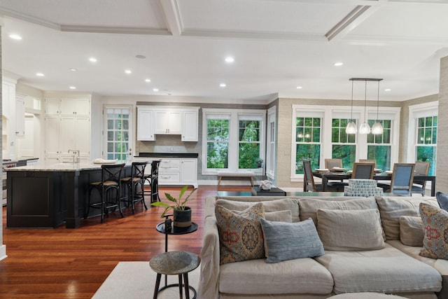 1501 June Ave S, Golden Valley, MN 55416 - living area featuring dark wood-type flooring, ornamental molding, recessed lighting, and a chandelier