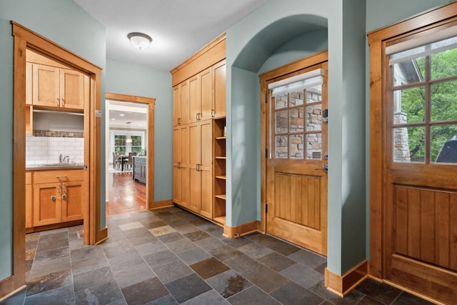 1501 June Ave S, Golden Valley, MN 55416 - foyer entrance with stone tile floors and arched walkways