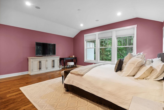 1501 June Ave S, Golden Valley, MN 55416 - bedroom with vaulted ceiling, wood finished floors, and recessed lighting