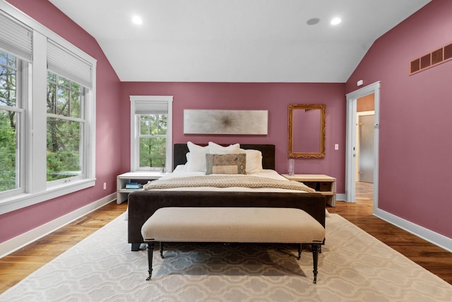 1501 June Ave S, Golden Valley, MN 55416 - bedroom featuring vaulted ceiling, wood finished floors, and recessed lighting