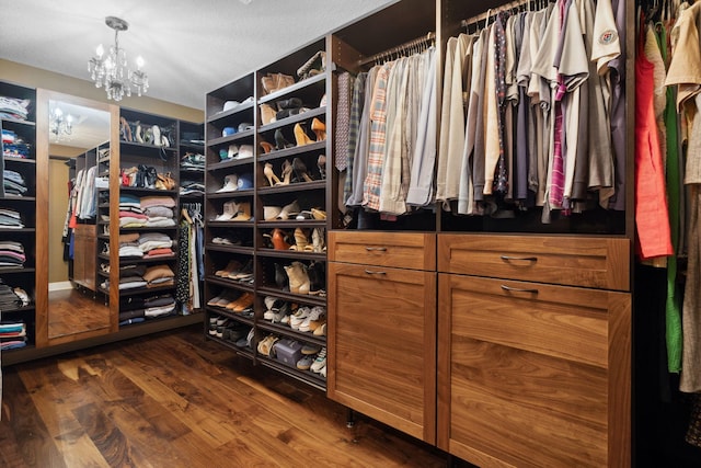 1501 June Ave S, Golden Valley, MN 55416 - spacious closet with a chandelier and dark wood-style floors