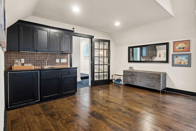 1501 June Ave S, Golden Valley, MN 55416 - indoor wet bar featuring vaulted ceiling, tasteful backsplash, dark wood-style floors, and recessed lighting