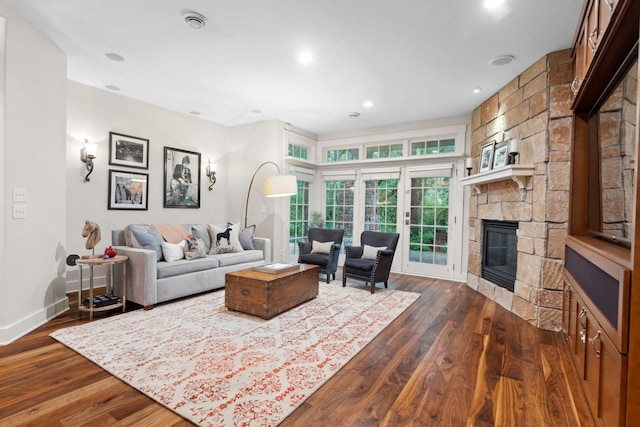 1501 June Ave S, Golden Valley, MN 55416 - living room with a stone fireplace, dark wood-style floors, and recessed lighting