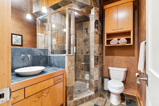 1501 June Ave S, Golden Valley, MN 55416 - bathroom featuring vanity, a stall shower, and tasteful backsplash