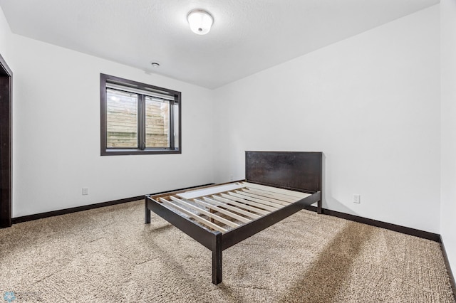 3004 6th St E, West Fargo, ND 58078 - carpeted bedroom with baseboards