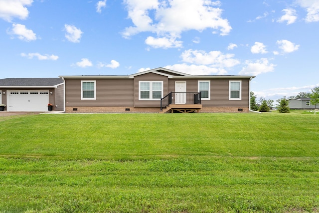 16536 Hook Cir, Pokegama Twp, MN 55030 - view of front of home featuring crawl space, a garage, and a front yard