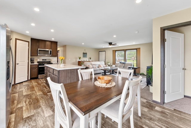 16536 Hook Cir, Pokegama Twp, MN 55030 - dining space with recessed lighting, wood finished floors, and a ceiling fan