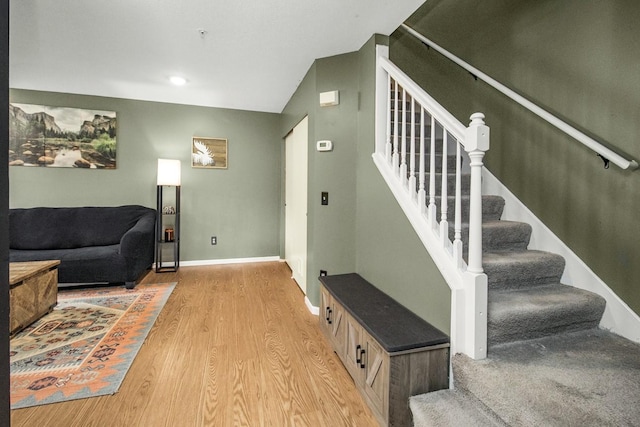 1146 100th Dr NE Unit A, Blaine, MN 55434 - staircase featuring wood finished floors and baseboards