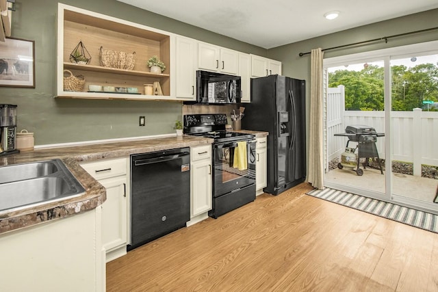 1146 100th Dr NE Unit A, Blaine, MN 55434 - kitchen with black appliances, white cabinetry, light wood-style flooring, open shelves, and recessed lighting