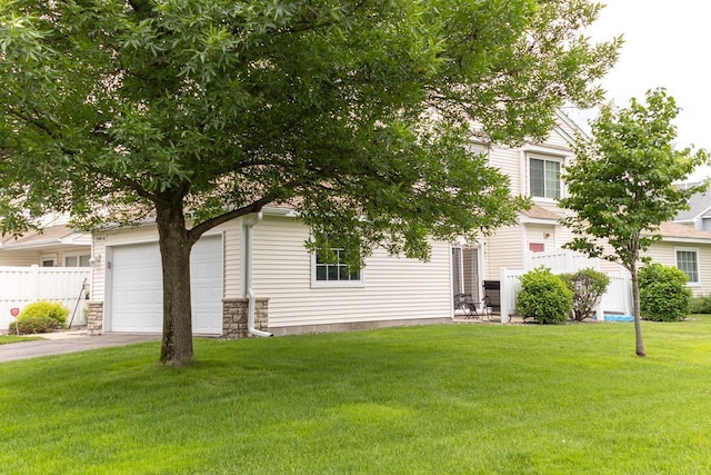 1146 100th Dr NE Unit A, Blaine, MN 55434 - view of front of house with driveway and a garage