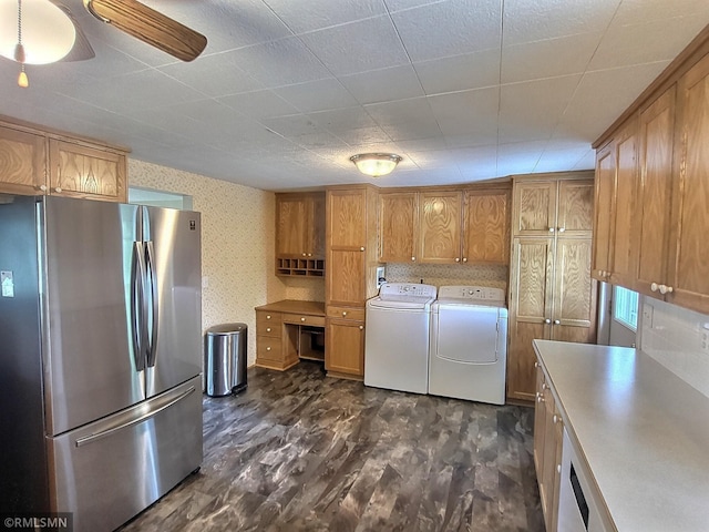 318 Alder Rd, Lynden Twp, MN 55382 - washroom featuring washing machine and clothes dryer, a ceiling fan, and wallpapered walls