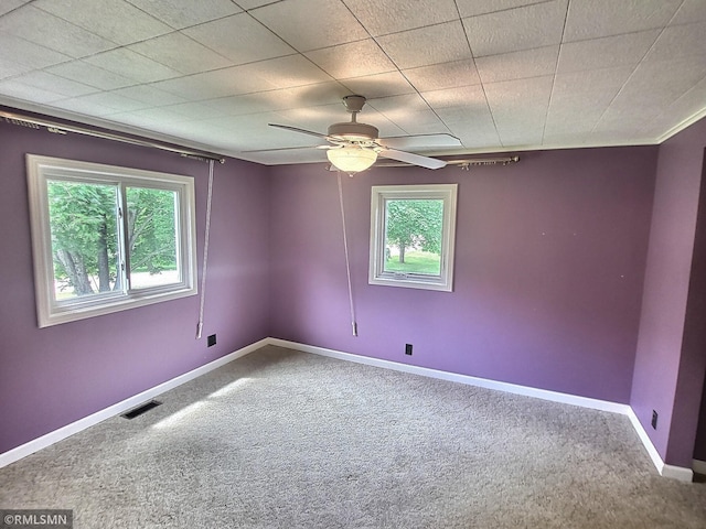 318 Alder Rd, Lynden Twp, MN 55382 - carpeted empty room with baseboards and a ceiling fan