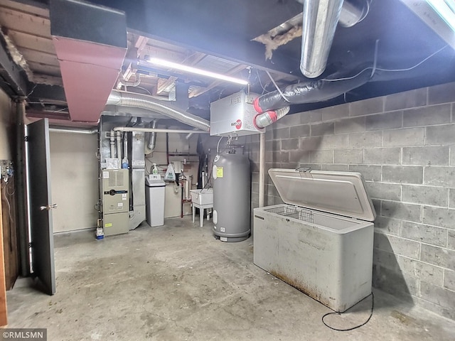 318 Alder Rd, Lynden Twp, MN 55382 - unfinished basement featuring water heater, concrete block wall, and a water softener system