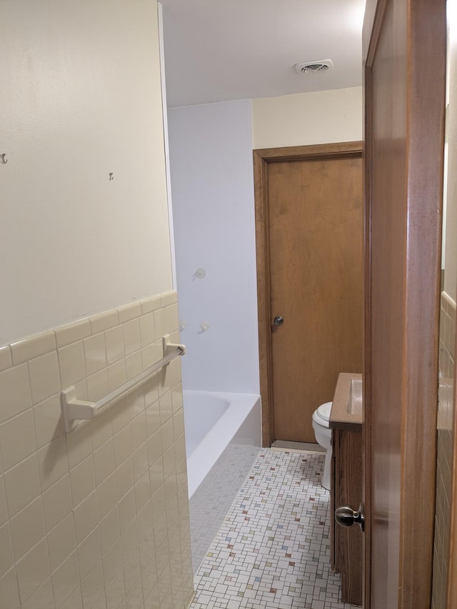 1193 County Road B E, Maplewood, MN 55109 - full bath featuring a tub to relax in and tile walls