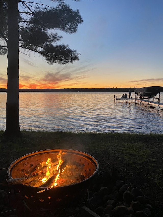 12332 Manhattan Point Blvd, Crosslake, MN 56442 - dock area featuring a water view and a fire pit