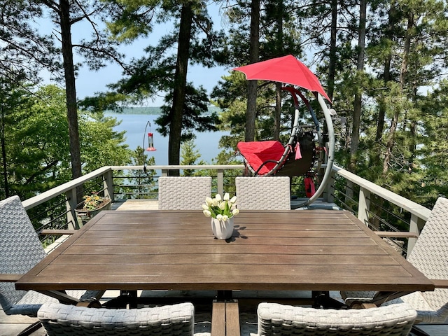 12332 Manhattan Point Blvd, Crosslake, MN 56442 - deck featuring outdoor dining space and a water view