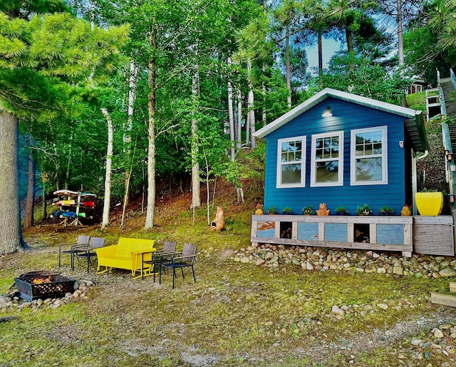 12332 Manhattan Point Blvd, Crosslake, MN 56442 - view of yard featuring an outdoor fire pit