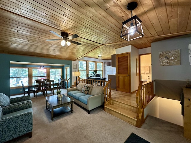 12332 Manhattan Point Blvd, Crosslake, MN 56442 - living room featuring wood ceiling, carpet floors, and ceiling fan