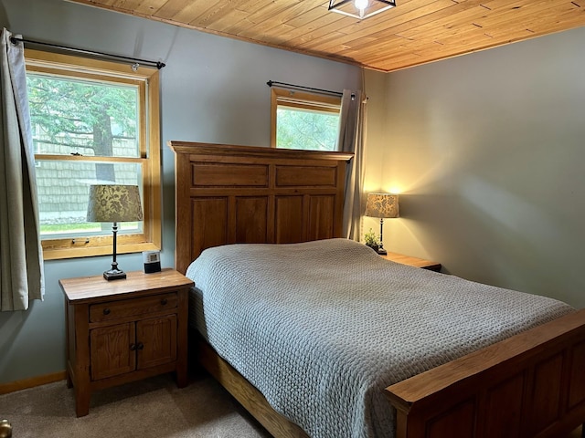 12332 Manhattan Point Blvd, Crosslake, MN 56442 - bedroom with wood ceiling and carpet