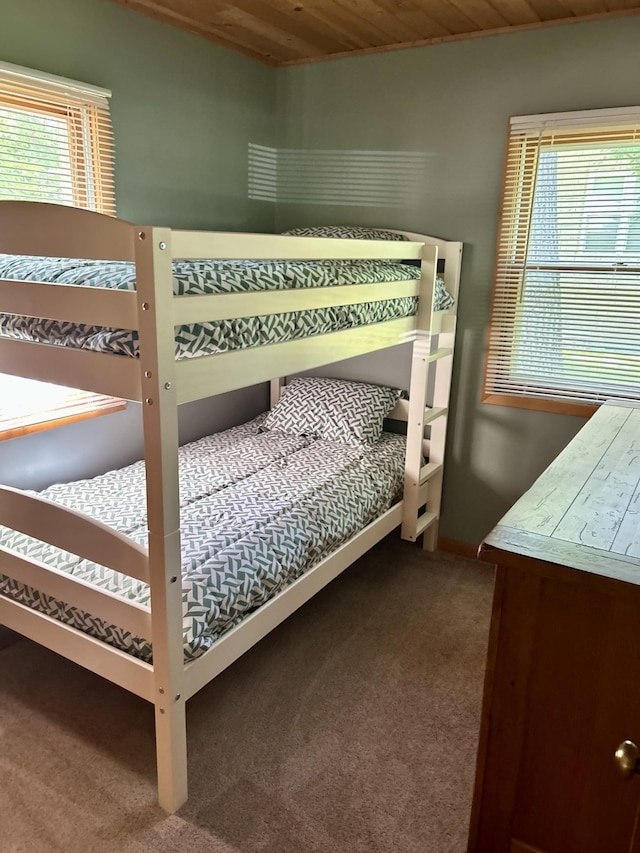 12332 Manhattan Point Blvd, Crosslake, MN 56442 - bedroom with carpet floors, multiple windows, and wooden ceiling