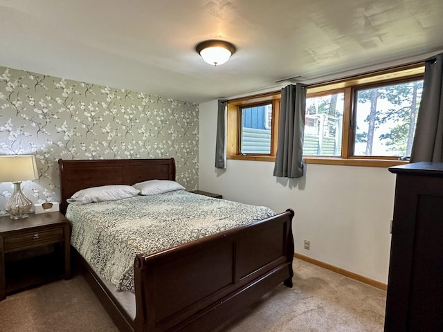 12332 Manhattan Point Blvd, Crosslake, MN 56442 - bedroom featuring wallpapered walls and light colored carpet